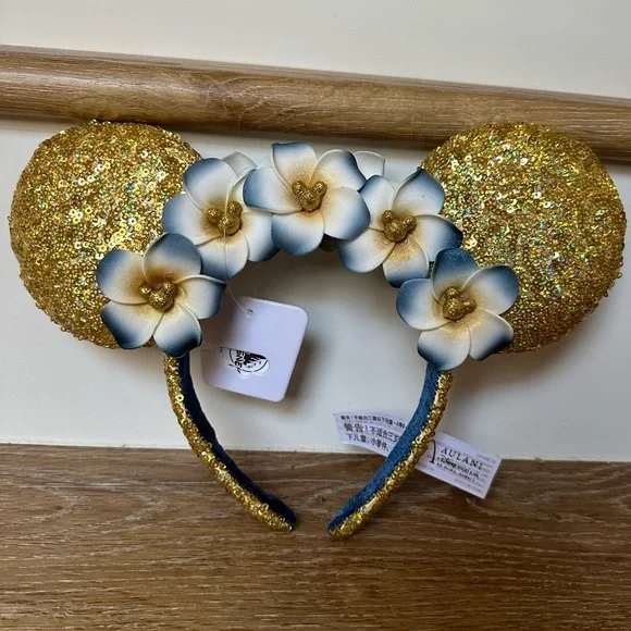 NWT Disney Aulani Reversible Gold Iridescent Ears